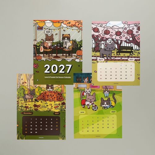 Four colorful calendar sheets featuring adorable cat illustrations and vibrant seasonal scenes, displayed against a neutral background.