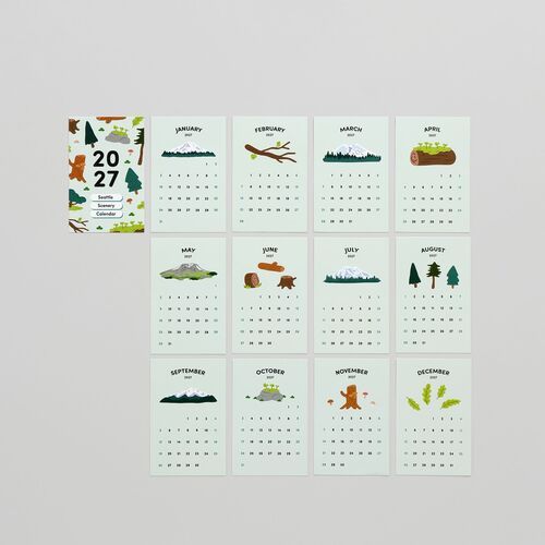 The image displays a set of 13 illustrated calendar sheets for 2027, each featuring scenic mountain and forest imagery with educational facts.