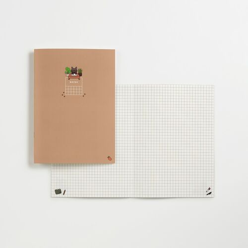 The notebook cover showcases a soft beige hue with charming Lana & Tuxedo Cat illustrations, accompanied by two grid and plain inner pages laid flat.