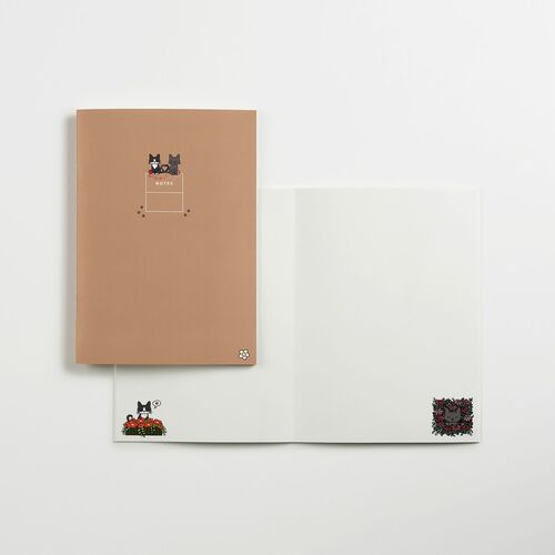 The image displays two notebooks with charming Lana & Tuxedo Cat illustrations, one in a warm beige cover and the other in white, both adorned with cute character decals.
