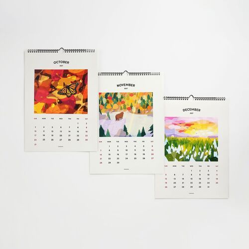 Three vibrant, illustrated calendar pages for October, November, and December 2027, featuring colorful nature scenes and butterfly, bear, and sunset motifs.