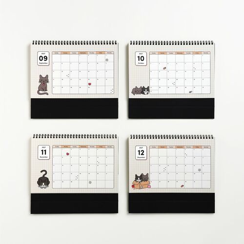 Four monthly calendar pages featuring adorable Lana and Tuxedo cat illustrations, each with colorful, playful designs and functional layouts.