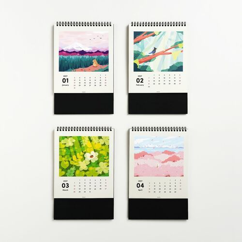 Four colorful 2027 calendar pages featuring vibrant nature illustrations, with spiral bindings and black base sections for easy flipping and display.