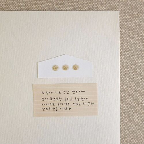 The image showcases a set of beige sticky notes with subtle textured surfaces, arranged neatly on a light-colored background, emphasizing their soft pastel tones and versatile design.