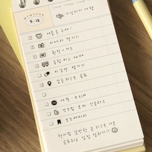 A cheerful, neatly organized planner page filled with hand-drawn icons and Korean text, showcasing the playful doodle style of the tape.