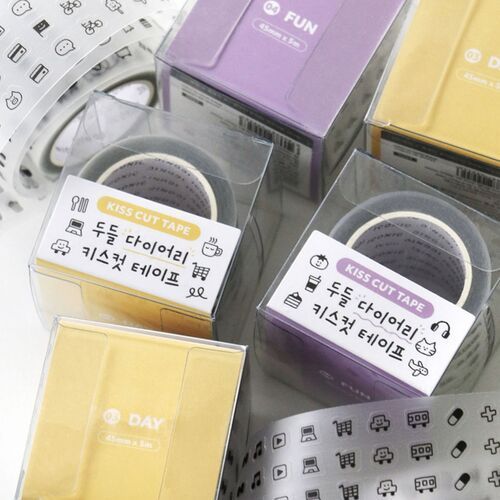 Colorful, compact tape dispensers with clear packaging showcase cute doodle illustrations and pastel-colored labels, emphasizing playful charm.