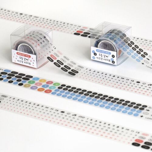 Colorful doodle date kiss cut tapes in red and blue are showcased with clear dispensers, revealing playful icons and precise application tools.