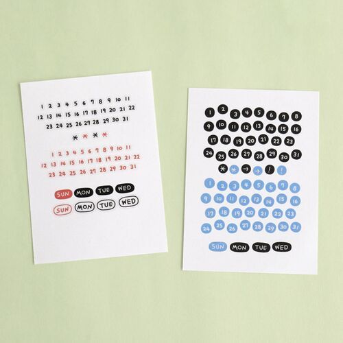 Two sheets of colorful doodle date stickers, featuring playful black, blue, and red designs with clear, rounded numbering and day labels.