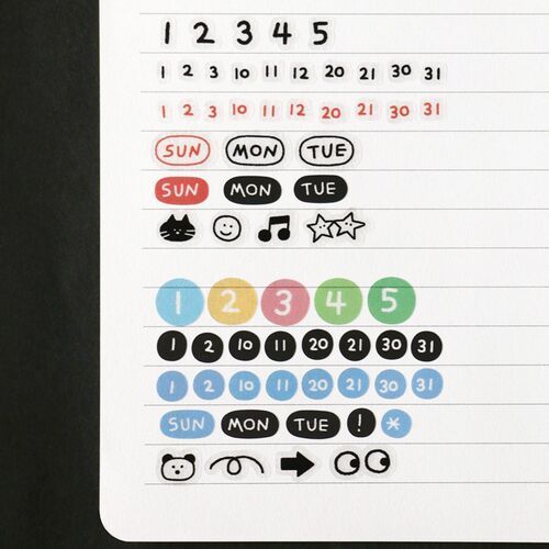 Colorful doodle stickers with playful icons and date labels are neatly arranged on a white background, showcasing their vibrant and fun designs.