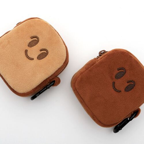 Two plush mini toast pouches in light and brown shades with embroidered smiling faces, positioned on a white background, highlighting their soft texture and cute design.