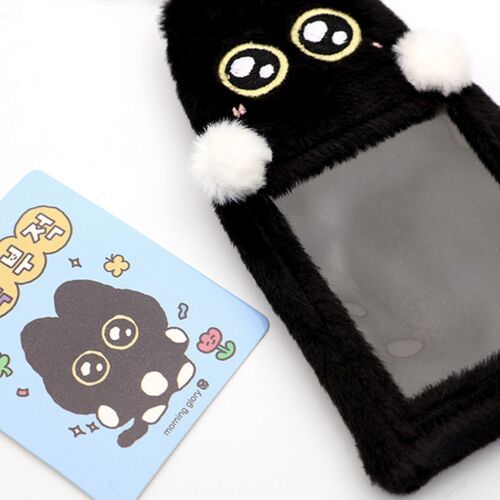 The plush black cat key ring features shiny embroidered eyes, white pom-pom paws, and a transparent card window, set against a white background.