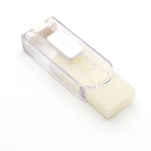Clear plastic casing reveals the small, white eraser inside, with a sliding mechanism and textured grip area visible from an angled view.