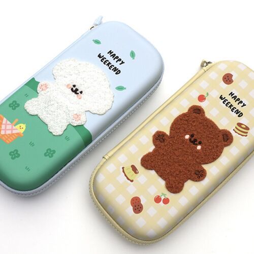 Two adorable plush patch pen cases with colorful, patterned backgrounds, showcasing their soft textures and cheerful designs.