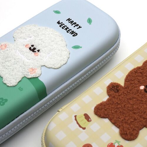 The image showcases two colorful, plush-themed pen cases with adorable bear and puppy designs, emphasizing their soft textures and playful aesthetics.