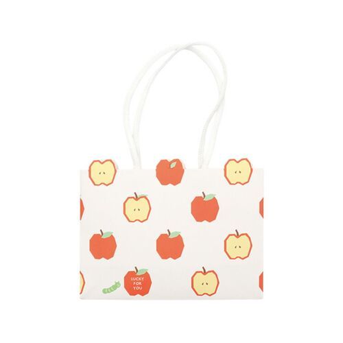 The small shopping bag features a cheerful white background adorned with bright red apples and yellow apple slices, accented by green leaves.