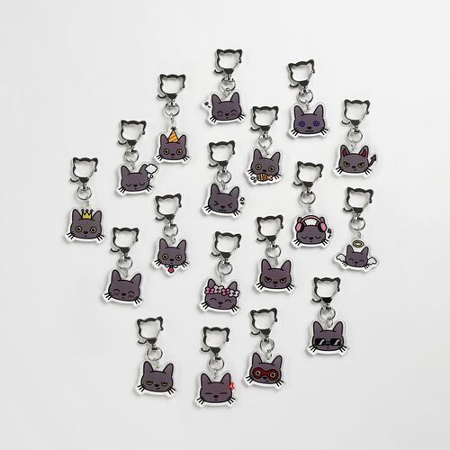 Multiple Lana Cat emoji acrylic key rings, each with expressive faces and playful accessories, arranged neatly on a white background.