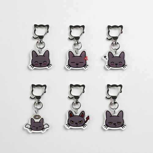 Six Lana Cat emoji acrylic key rings displayed on a white background, showcasing a variety of expressive feline faces with playful details.
