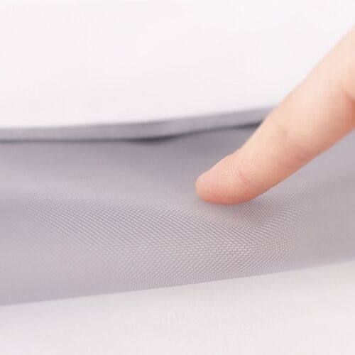 A close-up of the mesh pouch’s textured surface, with a finger gently pressing to showcase its soft, breathable material.