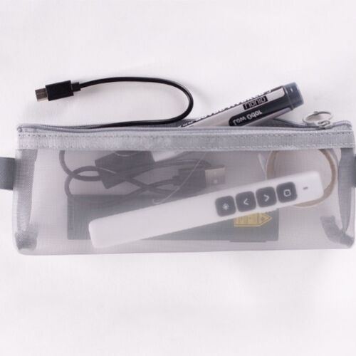 The transparent mesh pouch reveals various small tech accessories and a remote control, emphasizing its practicality and clear visibility.