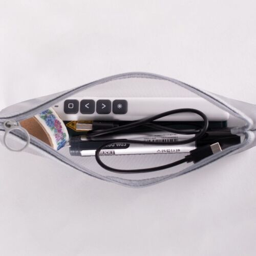 The mesh pouch is shown unzipped, revealing a neatly organized interior with a white electronic device and various small accessories inside.