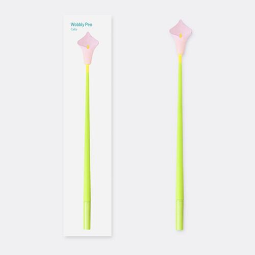 A playful pastel pink flower-shaped gel pen with a bright lime green wobbling silicone body, displayed alongside its packaging on a clean white background.