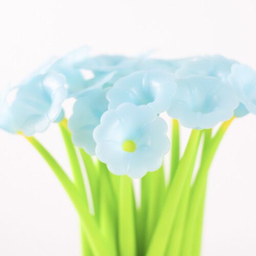 Soft pastel blue flower-shaped gel pen with a wobbling silicone body and vibrant green stems, set against a plain white background.
