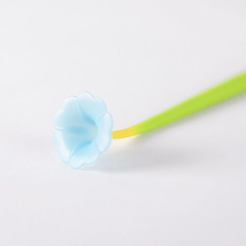 A playful pastel blue flower-shaped silicone tip attached to a bright yellow-green stem, set against a clean white background.