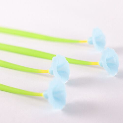 Three playful flower-shaped gel pens with bright green stems and light blue blossoms are arranged diagonally against a white background, emphasizing their cheerful design.
