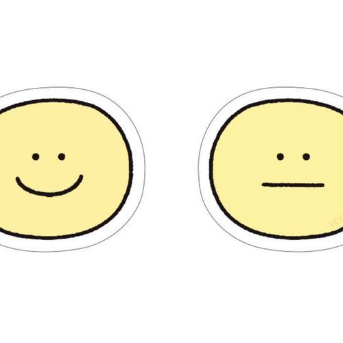 Smile is shown front and back with a happy yellow face and a straight-faced reverse design.