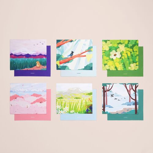 The full assortment presents twelve Seattle scenery choices, including floral, forest, mountain, water, and seasonal designs in coordinated colors.