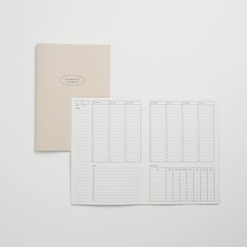 Cream Ivory displays ruled inner pages with a notes column and clearly divided daily planning areas.