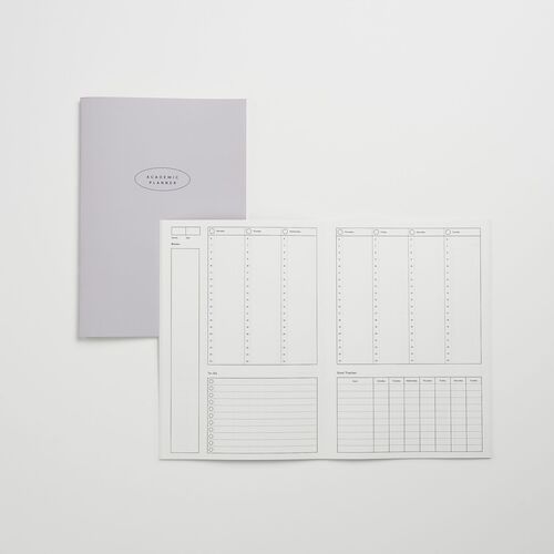 Misty Lilac is paired with a plain interior featuring open writing space, hourly scheduling, and structured tracking sections.