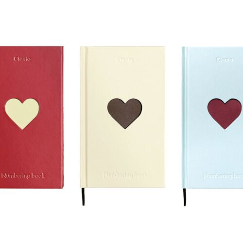 The final product view presents all three hardcover journals with their matching heart-centered cover designs.