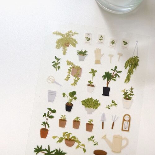 A closer view shows leafy houseplants, hanging greenery, plant labels, gardening gloves, and miniature tools across the sticker sheet.