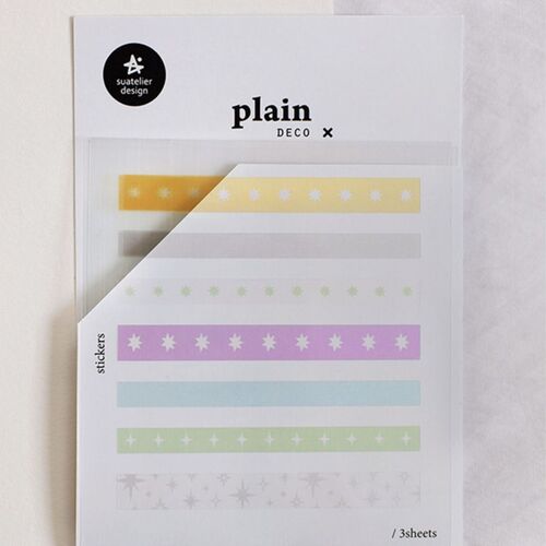 A closer package view shows repeated sparkle motifs arranged in long horizontal sticker bands.