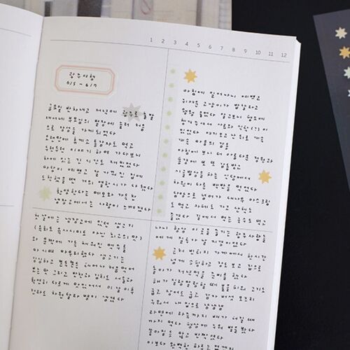 A planner spread uses the starburst stickers and a Green strip to separate handwritten entries across dated sections.