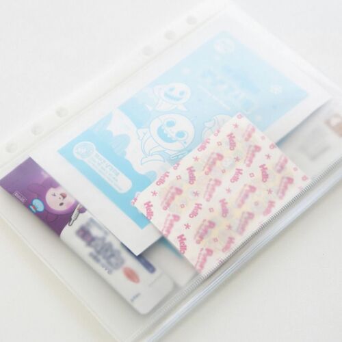 The clear pocket holds flat stationery pieces while the zipper edge stays visible for quick opening and closing.