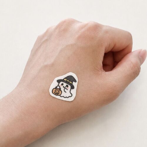 A sharper view shows the Cute Halloween ghost settled neatly on the hand with a fine transparent edge.