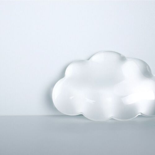 Displayed upright against a plain background, the cushion’s broad cloud profile and softly domed shape are easy to see.