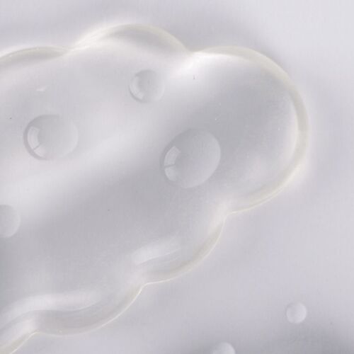 The underside is shown close up with several rounded contact points that help create an anti-slip base on the desk.