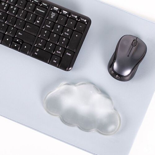 A keyboard and mouse frame the wrist rest from above, highlighting its practical position for everyday typing and navigation.