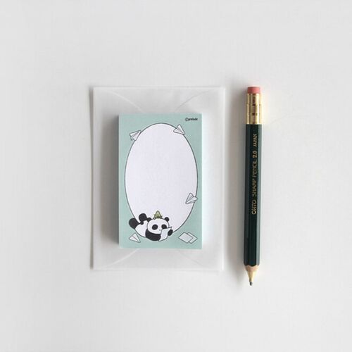 The mint Paper Plane pad sits beside a pencil, highlighting its medium format and large open memo area.