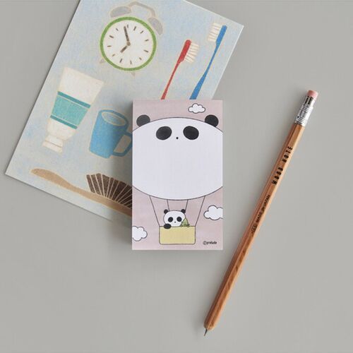 A Hot Air Balloon sheet is styled with a notebook and pencil, showing the roomy pastel writing area.