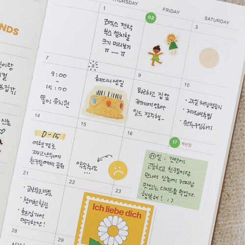 A close view of handwritten monthly planning shows the calendar’s roomy boxes in everyday use with a pen.