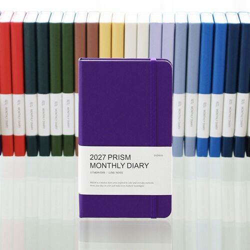 A full color lineup displays the planner’s broad palette, including purple, red, green, blue, neutral, and black covers.