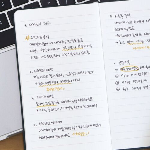 Milky Blue and Mocha Mousse planners are stacked beside a coffee cup and open calendar for a calm desk-planning scene.