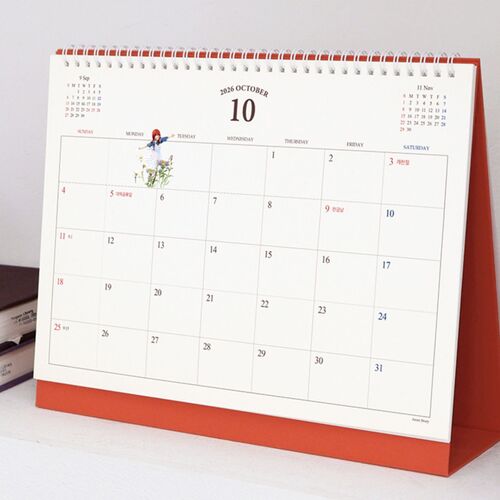 The October layout is filled with colorful notes and stickers, demonstrating how much writing room each date box provides.