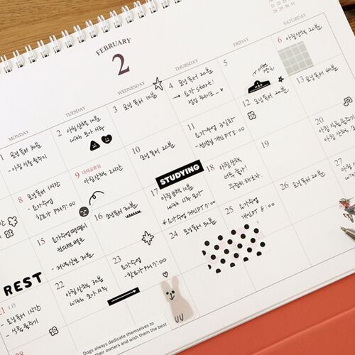 Colorful handwritten entries and highlighted tasks demonstrate how the calendar can organize detailed daily schedules.