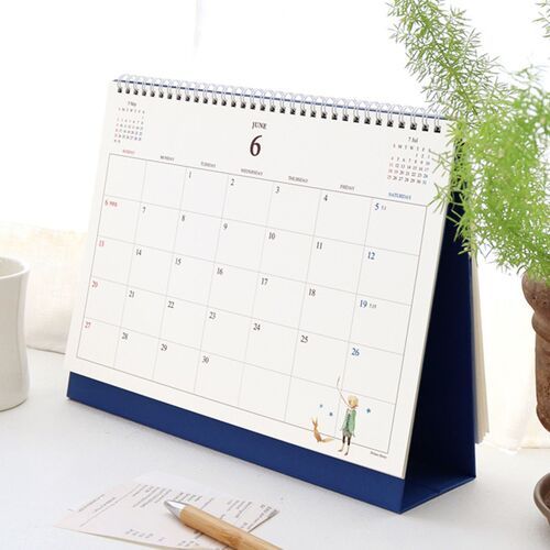 A filled April page demonstrates how appointments, reminders, colored marks, and handwritten notes fit inside the monthly boxes.