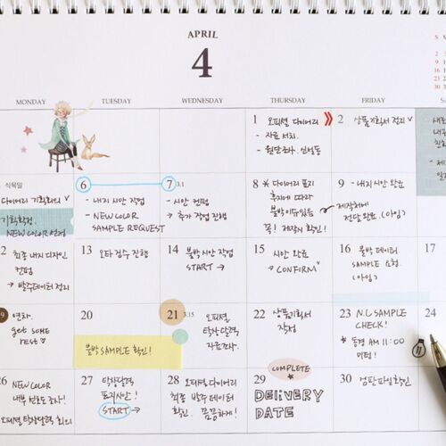 Handwritten notes and colorful highlights demonstrate how the open monthly boxes handle detailed plans and reminders.